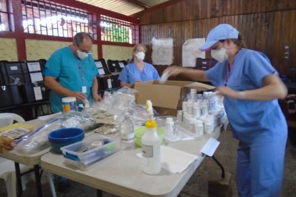 John, Pharmacist with Pharmacist Assistant - Mindy and Jacy are preparing medications