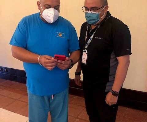 Felipe, Medical Clinic Program Director, with Luis, Chief Operations Officer